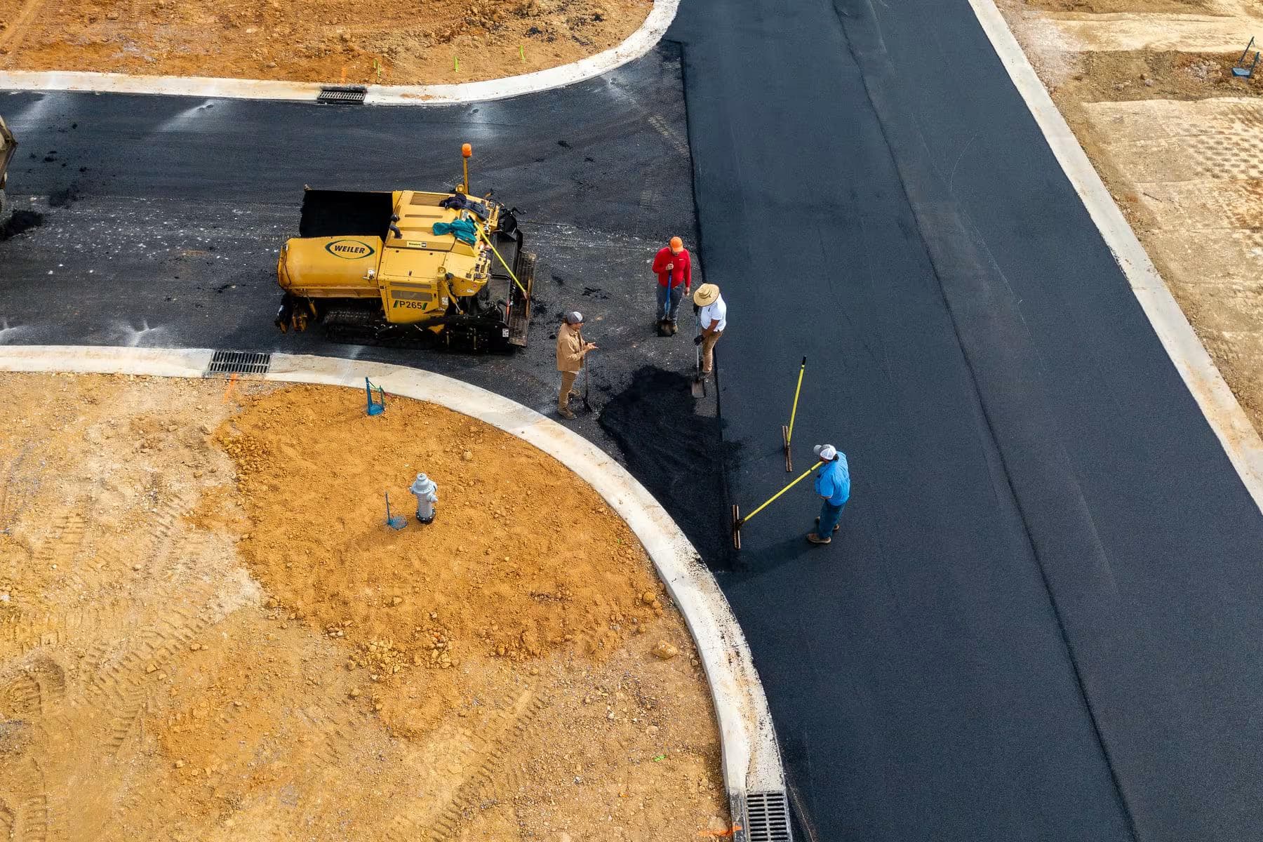 A privately maintained subdivision road in Johnson City, TN, showing excellent pavement condition managed by the HOA.