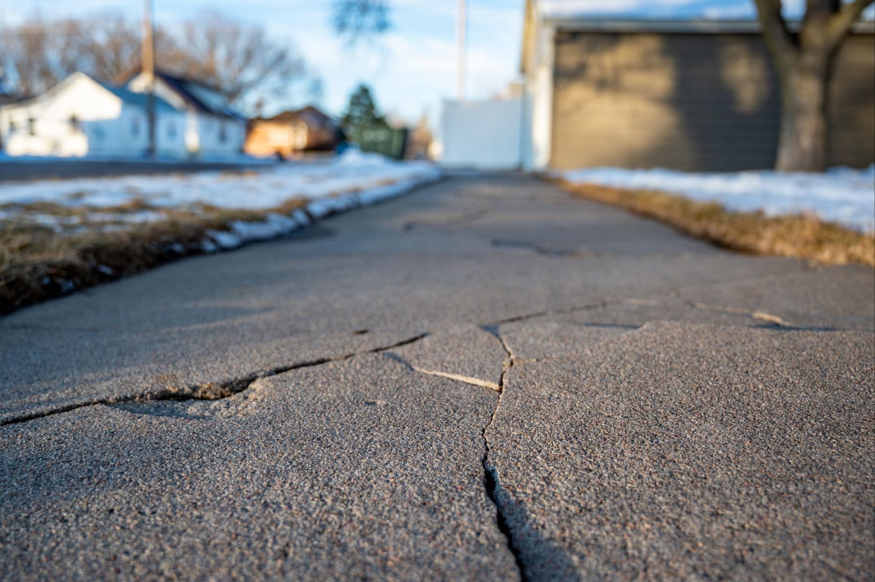 Cracked sidewalk due to winter free-thaw cycles
